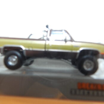 Brekina 19653 GMC Sierra Grande braun/gold Filmauto Ein Colt für alls Fälle