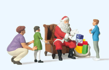 Preiser 44931 - G Weihnachtsmann in Sessel.Mutter mit Kind